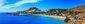 Na východním pobřeží ostrova Rhodos, na skalnatém vrcholu vybíhajícím do moře leží jedno z nejkrásnějších a nejobdivovanějších míst na ostrově – vesnice Lindos